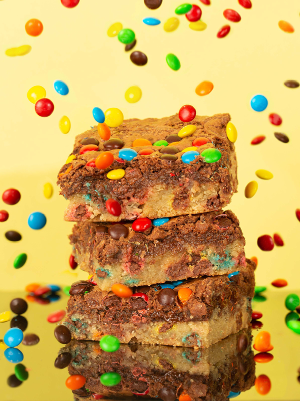 M&Ms raining on a stack of Connor Man Brookies